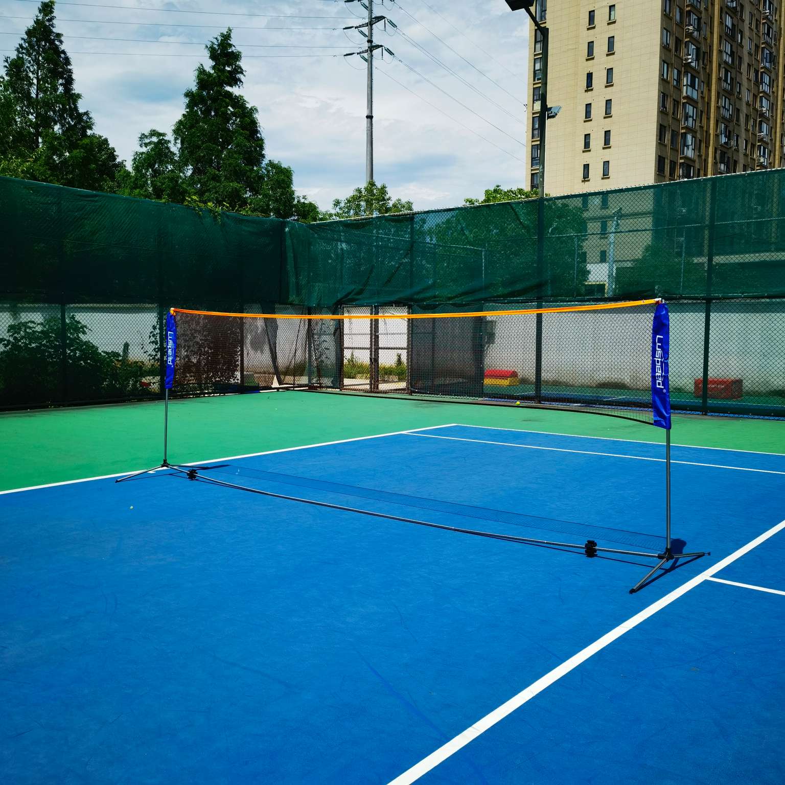 Adjustable height badminton training system by Luspeed Sports