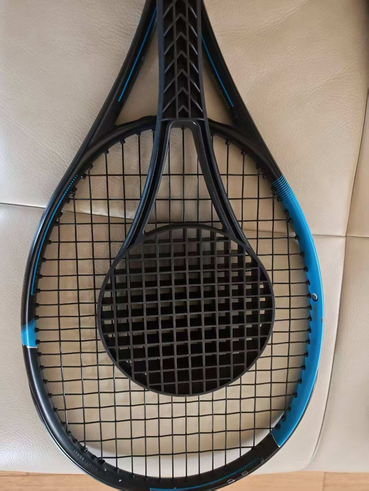 Tennis sweet spot trainer comparison with standard racket